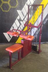 natilus shrug machine